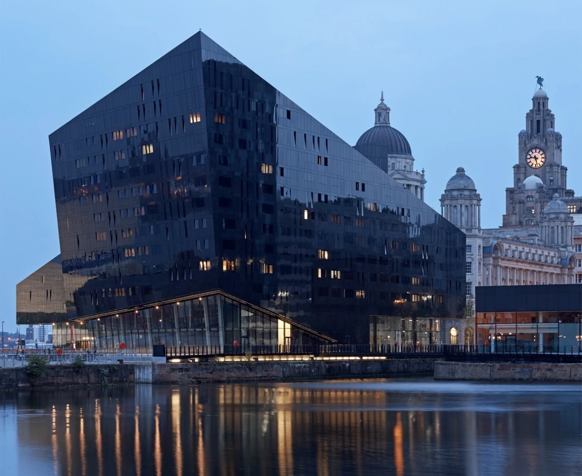 Liverpool waterfront at blue hour, featuring Mann Island and the Royal Liver Building Liverpool waterfront at blue hour, featuring Mann Island and the Royal Liver Building